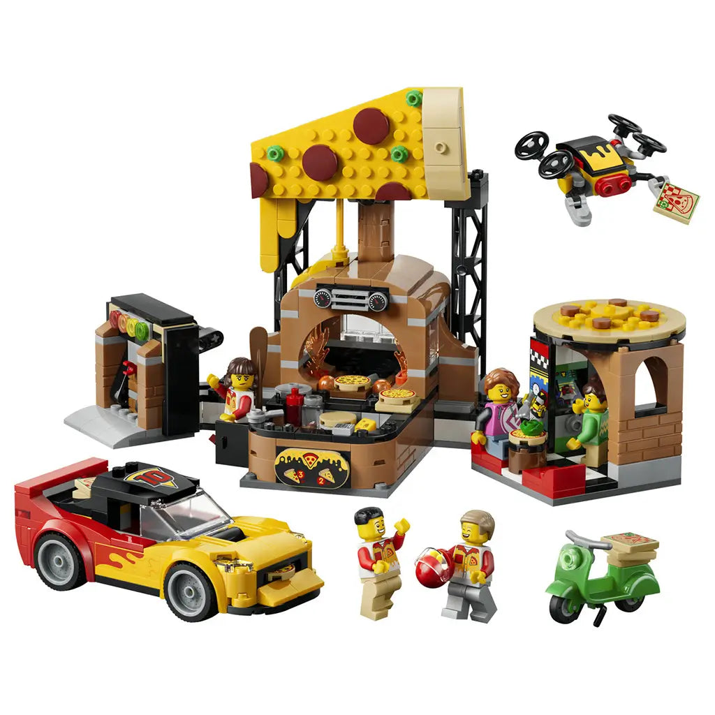LEGO City Pizza Delivery Experience in yellow, brown, red, and green plastic bricks features a pizza shop with slice-shaped roof, sports car, scooter, drone, and minifigures.