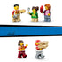 LEGO City pizza delivery minifigures in colorful plastic outfits include workers and customers holding a pizza, fork, sauce bottle, pizza cutter, and stacked pizza boxes.