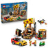 LEGO City Pizza Delivery Experience set 60496 in yellow, brown, red, and green plastic bricks includes a pizza shop, sports car, green scooter, delivery drone, and minifigures.