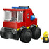 LEGO City Fire Truck built from bright red plastic bricks with yellow accents, compact boxy cab, clear windshield, blue light bar, hose detail, six chunky wheels, and a firefighter minifigure on a white background.