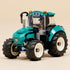 LEGO City tractor playset fully assembled on display, showing a teal plastic farm tractor with oversized treaded tires, enclosed cab, roof lights, and farmer minifigure ready for farm work.