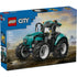 LEGO City Tractor box front showing blue branded packaging with a teal farm tractor, large rolling wheels, farmer minifigure, muddy field background, and age 6+ building toy details.