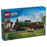 LEGO City Vintage Steam Train set 60511 box front in blue shows a green, black, and red brick locomotive, passenger car, station platform, and minifigures on railway track.