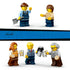 LEGO City Vintage Steam Train minifigures in blue, brown, tan, and gray outfits include a railway worker with shovel, passenger, server with carafe, and two travelers.