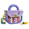 LEGO Creator Fashion Bag 31391 in lavender, purple, coral and mint plastic, shaped as a handbag with heart details, gold clasp, roller skate charm and yellow key charm on white.