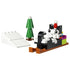 LEGO Creator Cataclaws Snow Adventure toy in black, white, green, red and brown plastic bricks, shaped as a cat on a sled with a pine tree and snow ramp, isolated on a clean studio background.