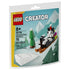 LEGO Creator Cataclaws Snow Adventure building set in black, white, green and brown plastic brick form, shaped as a playful cat riding a sled through a snowy mountain scene on retail pouch packaging.