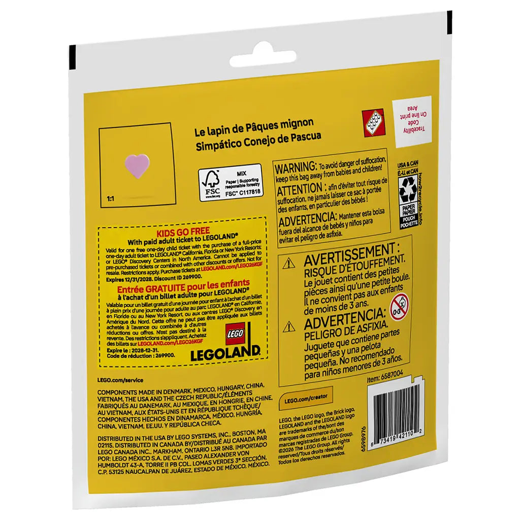 LEGO Creator Cute Easter Bunny building set package back showing bright yellow cardboard packaging, smooth glossy finish, multilingual safety warnings, FSC paper icons, LEGOLAND promotion, recycling symbols, and product information details.