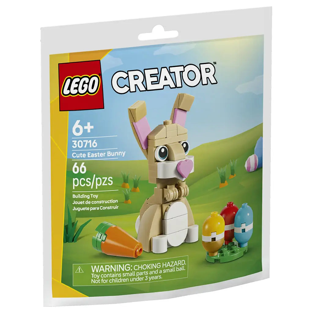 LEGO Creator Cute Easter Bunny building set package front showing pastel green and blue spring artwork, glossy cardboard pack, tan bunny model with pink ears and heart nose, colorful eggs, carrot accessory, age 6+ label, and 66-piece count.