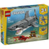 LEGO Creator Fierce Shark box front showing a gray brick-built shark with smooth plastic texture, sharp teeth, streamlined fins, and underwater accessories illustrated on bright yellow and blue retail packaging.
