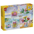 LEGO Creator 3-in-1 set 31383 box back in yellow and pink shows clear plastic brick builds for a floral perfume bottle, compact, picture frame, and flower vase.