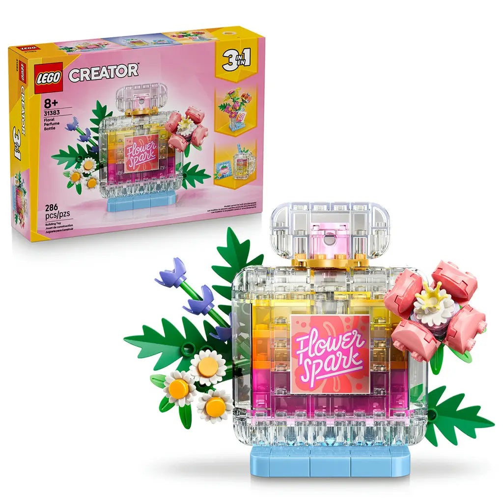 LEGO Creator 3-in-1 set 31383 pairs a pink and yellow box with a clear plastic brick floral perfume bottle featuring green leaves, pink blooms, and a blue base.