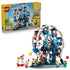 LEGO Creator Iconic Ferris Wheel 31389 in white, blue and red plastic, displayed with its retail box, passenger gondolas, ticket stand and five minifigures on white.