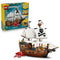 LEGO Creator Iconic Pirate Ship 31387 in brown, white and black plastic, displayed with its retail box, skull sail, pirate minifigures and red sea monster on white.