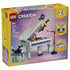 LEGO Creator Music Decor Piano 31392 box in yellow and pastel purple, showing the 485-piece 3-in-1 mint grand piano with black cat, stool, microphone and alternate builds.
