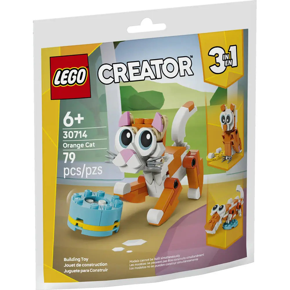 LEGO Creator Orange Cat box front, bright yellow and green cardboard packaging with glossy print, rectangular hanging pouch shape, featuring the orange and white brick-built cat model, age 6+, 79-piece set branding, and playful illustrated background.