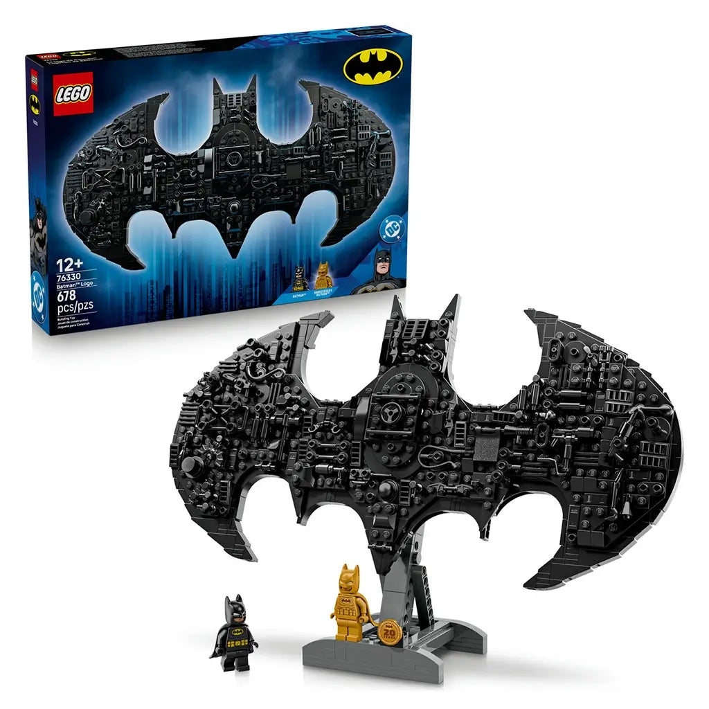 LEGO Batman logo set with box in blue and black cardboard, detailed bat-shaped display model and minifigures, collectible building toy presented on a clean studio background.