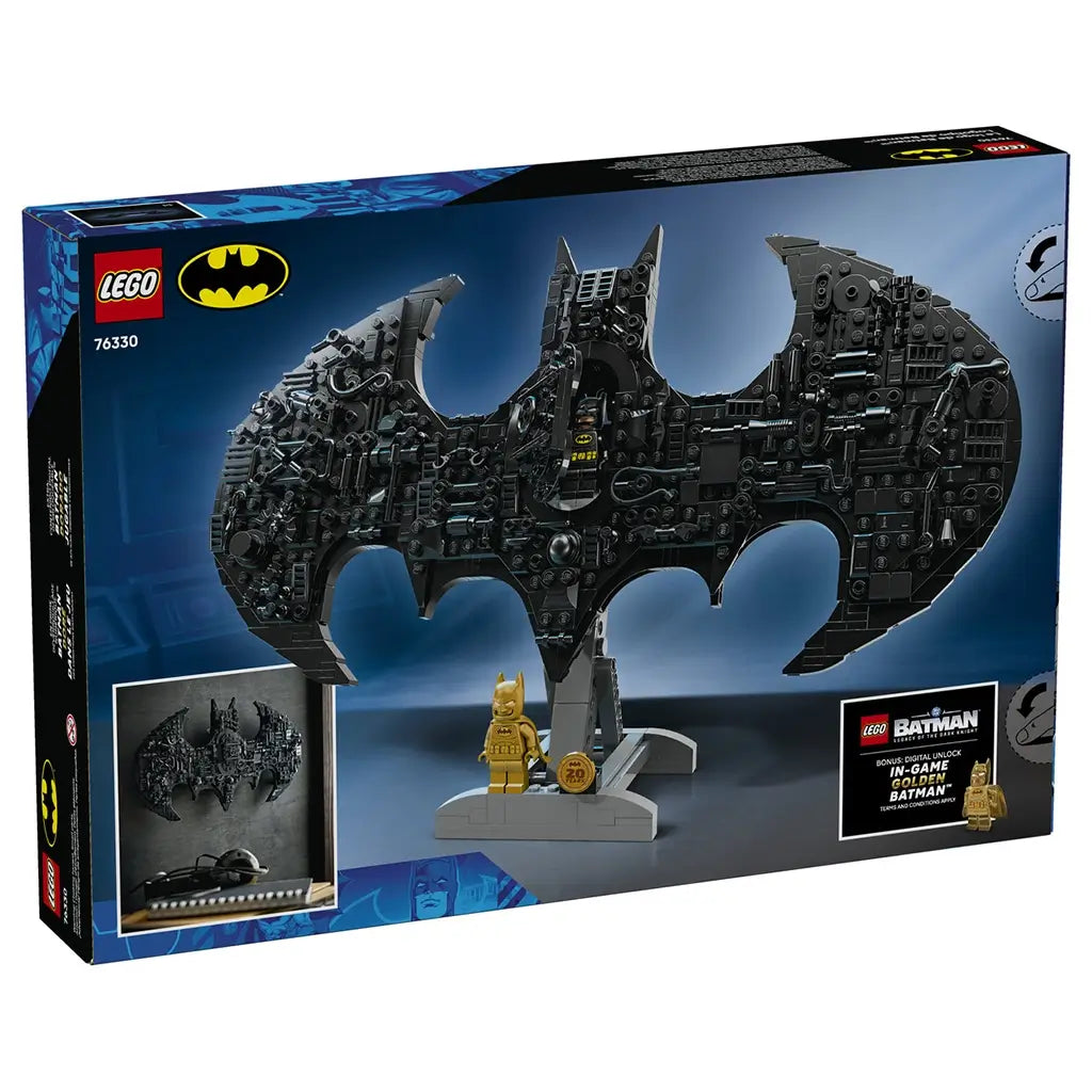 LEGO Batman logo package back in blue cardboard, rectangular box showing display stand, features, and gold minifigure bonus, product details illustrated on a stylized city skyline background.