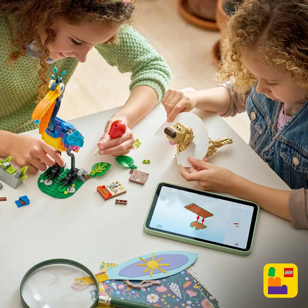 LEGO Disney Pixar Up building set in colorful plastic bricks, children assembling Kevin bird and Dug dog figures with tools and instruction tablet, creative play activity on a light tabletop.