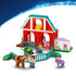 LEGO Disney Toy Story ranch playset features red, teal, green and lavender plastic pieces forming a barn, paddock and stable scene with horse figures on a light studio background.