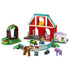 LEGO Disney Toy Story ranch playset features red, teal, green and lavender plastic buildings, horse figures, fencing and character minifigures arranged on a light studio background.