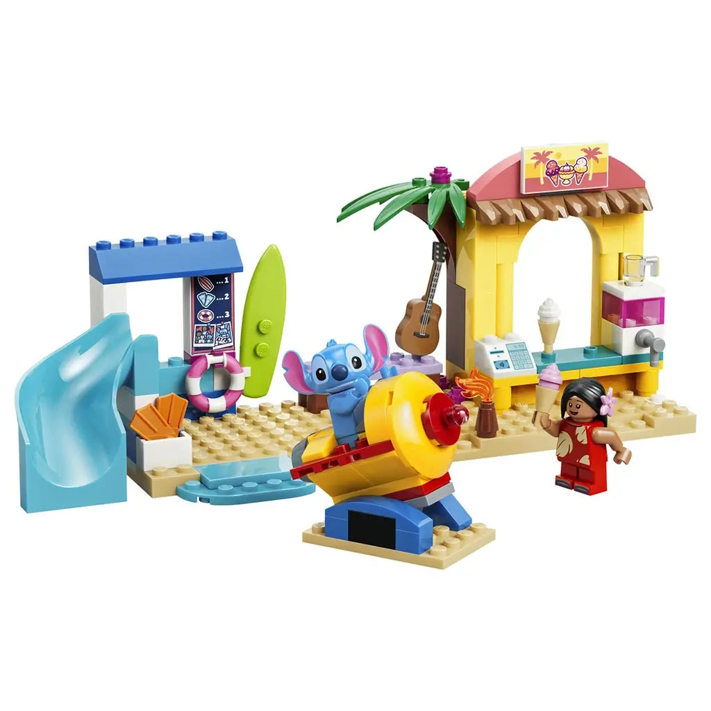 LEGO Disney Beach Fun with Lilo & Stitch set in blue, yellow, tan, and pink plastic features a slide, surfboard, ice cream stand, plane ride, Stitch, and Lilo.