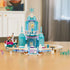 LEGO Disney Frozen Elsa’s Ice Castle fully assembled in translucent blue plastic, tall crystal-style tower with balcony and snow ride track, displayed neatly on a table in a softly lit home environment.