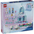 LEGO Disney Frozen Elsa’s Ice Castle & Snow Ride Adventure back-of-box packaging, blue cardboard panel showing included minifigures, accessories, modular castle build steps, and track layout on a pastel background.