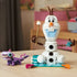 LEGO Disney Frozen Olaf and Bruni set fully built, featuring white snowman with carrot nose, blue chest tiles, twig arms, picnic accessories, and Bruni displayed on a tabletop.