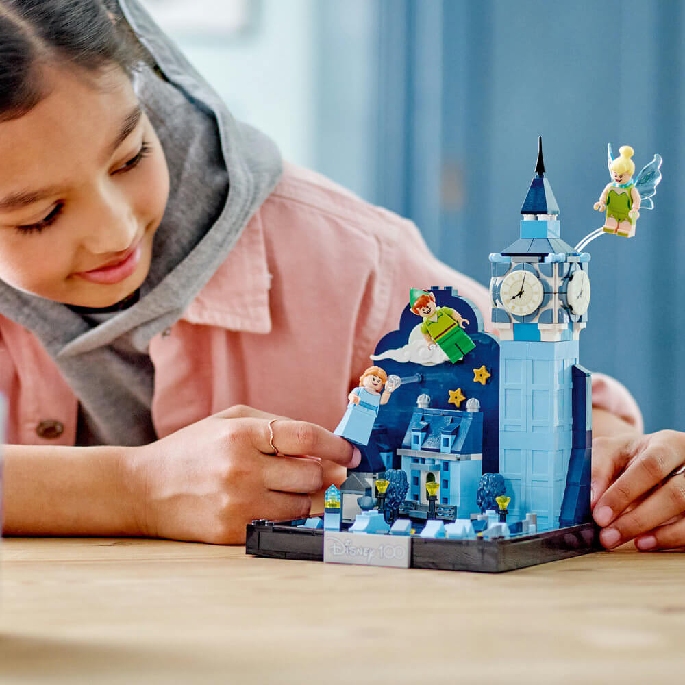 Child playing with the LEGO® Disney Peter Pan & Wendy's Flight over London 466 Piece Building Set (43232)