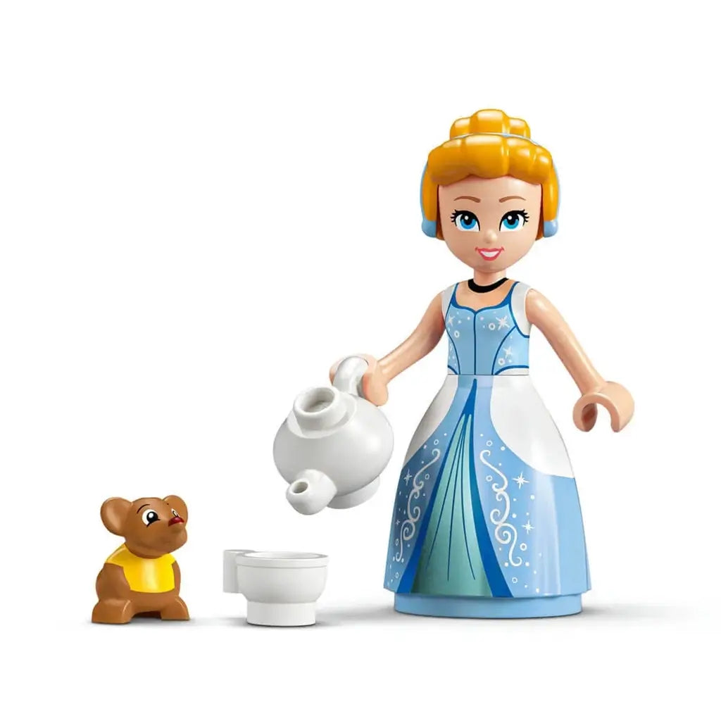 LEGO Disney Princess Cinderella minifigure in a light blue and white gown with a gray teapot, cup and small brown mouse accessory, displayed on a clean white background for collection.