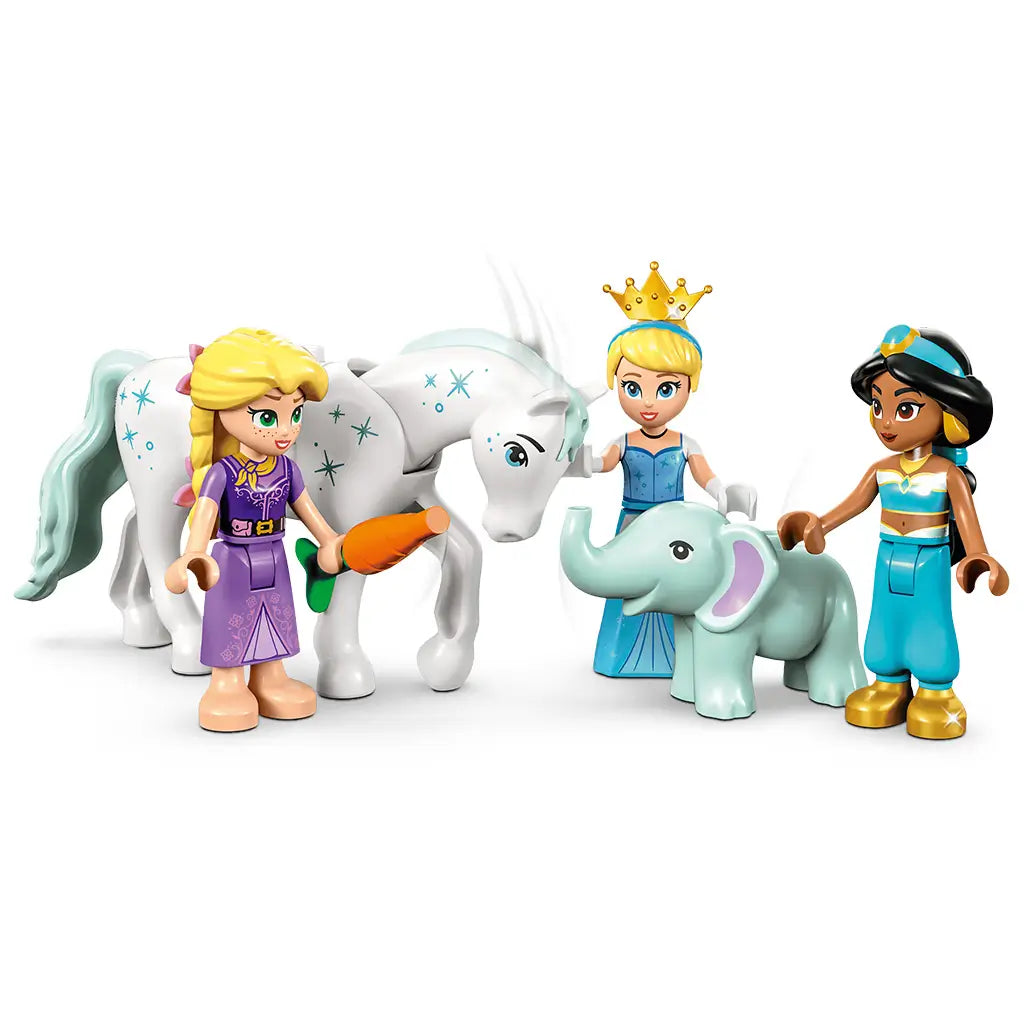 LEGO Disney Princess figures in purple, blue and turquoise plastic show Rapunzel, Cinderella and Jasmine beside a white horse and mint elephant on a white background.