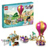 LEGO Disney Princess 43216 set in pink, purple, turquoise, white and gold plastic is displayed with its box, balloon, carriage, flying carpet, animals and figures.