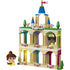 LEGO Disney Princess castle playset featuring tan and pastel plastic bricks, a tiered arched tower with blue spires, pink flag, heart accents, and balcony details, displayed on a white background.