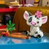 LEGO Disney Moana Pua set in white, gray, pink, green, brown, and orange plastic shows the seated pig with a pink flower beside a leafy plant and Heihei on a canoe-style base.
