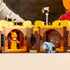 LEGO Disney Winnie the Pooh close-up in yellow and brown plastic, honey pot with dripping honey and small bees, detailed scene with mini Pooh and Eeyore figures in a cozy setting.