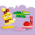 LEGO DUPLO Animal Building Game pieces form a yellow rabbit, green crocodile and red snail with chunky plastic bricks and playful faces on a lavender background.