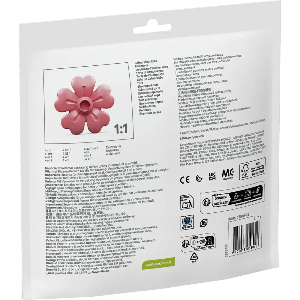 LEGO DUPLO Celebration Cake package back, white cardboard pouch with a matte texture, flat rectangular layout showing multilingual product information, safety warnings, piece details, recycling symbols, barcode, and official LEGO branding.