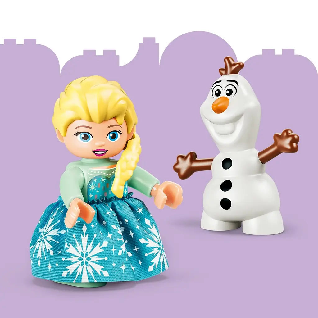 LEGO DUPLO Disney Frozen figures feature Elsa in a turquoise snowflake dress and white Olaf with orange nose and brown arms, posed together on a lavender background.
