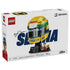 LEGO Ayrton Senna Helmet set 43024 comes in a white cardboard box showing the yellow, green and blue helmet display with Senna minifigure, plaque and 931-piece labeling.
