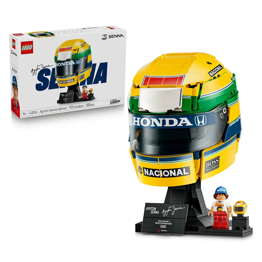 LEGO Ayrton Senna Helmet set 43024 pairs its white product box with a yellow, green and blue brick-built racing helmet on a black stand, plaque, minifigure and mini helmet.