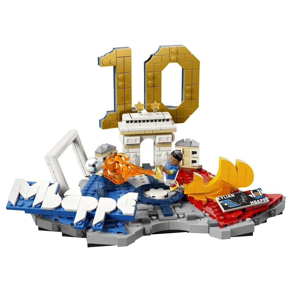 LEGO Kylian Mbappé soccer highlights model features blue, white, gold and red plastic brick construction shaped as a football action display with number 10, goal, landmark details and player minifigure.