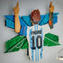 LEGO Lionel Messi wall décor features white, sky-blue and green textured plastic brick elements forming a number 10 Argentina jersey celebration scene with raised arms displayed prominently on an interior wall.