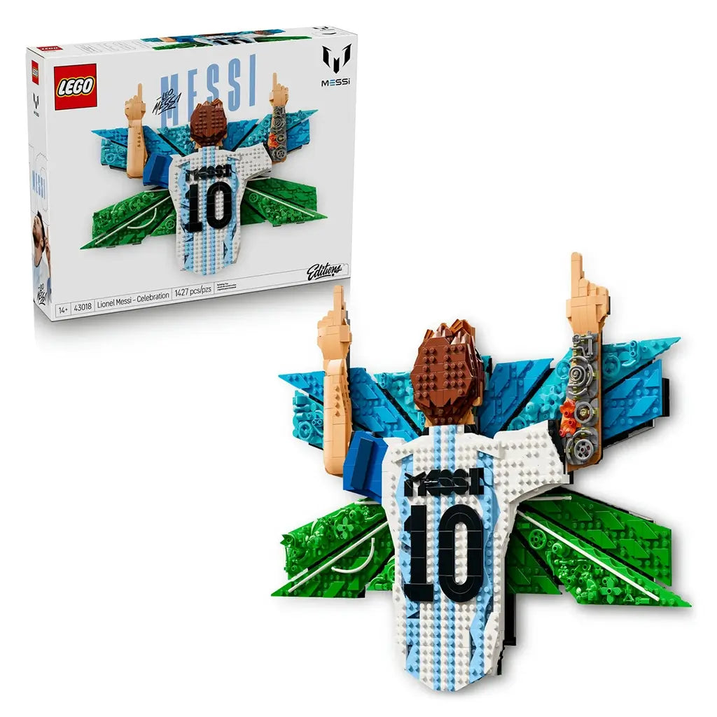 LEGO Lionel Messi wall art collectible features white, sky-blue, green and tan plastic brick construction forming Messi’s number 10 Argentina jersey celebration pose with a layered geometric soccer backdrop.
