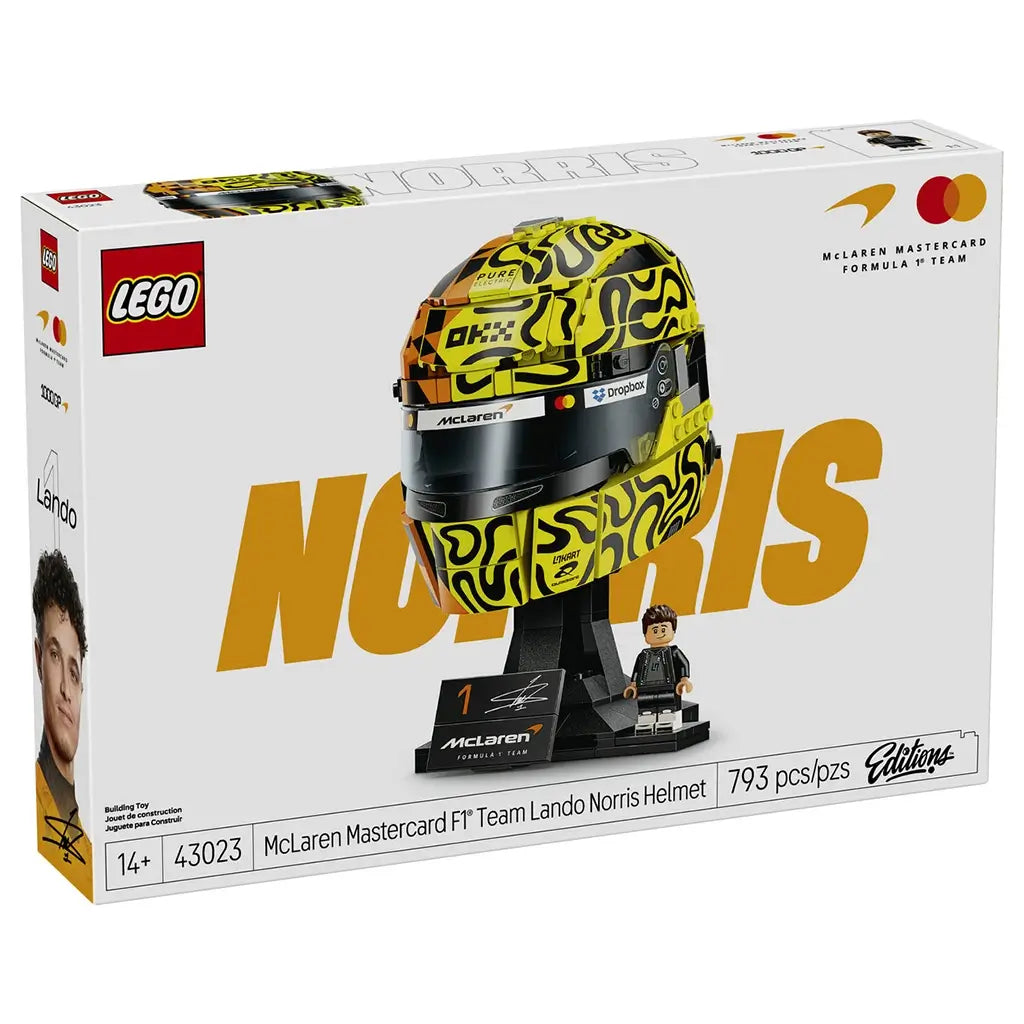 LEGO McLaren Formula 1 helmet retail box showcases yellow, orange and black plastic helmet artwork, Lando Norris branding, a display stand and collectible minifigure on premium packaging.