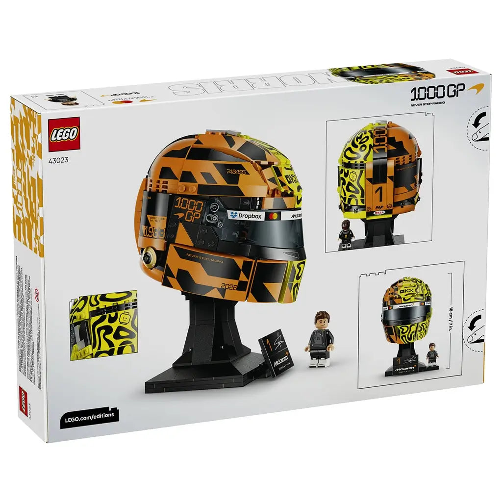 LEGO McLaren Formula 1 helmet package back displays yellow, orange and black plastic model views, racing-inspired graphics, a Lando Norris minifigure and product dimensions on retail packaging.