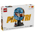 LEGO McLaren Formula 1 helmet set packaging features blue, orange and black plastic brick construction replicating Oscar Piastri’s racing helmet with visor, display stand and collectible minifigure.