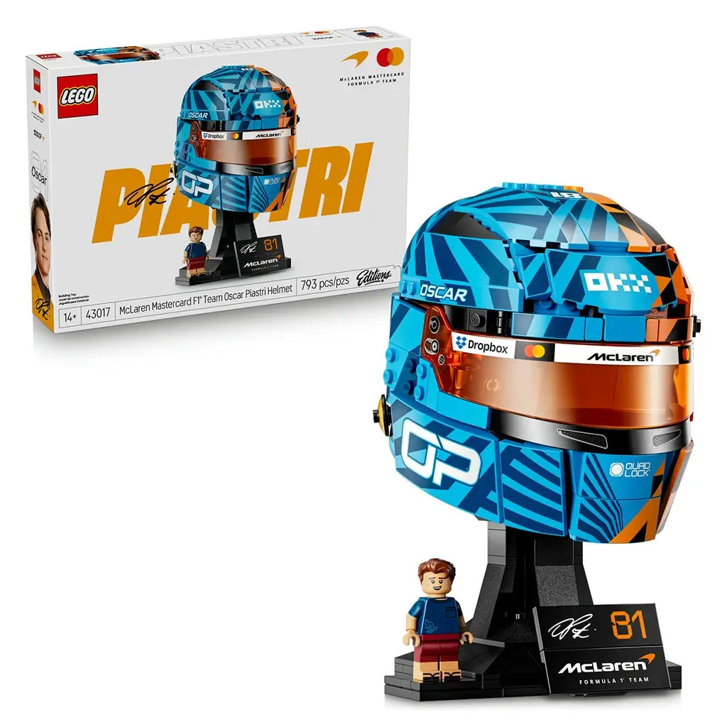 LEGO McLaren Formula 1 helmet collectible features blue, orange and black plastic brick construction shaped as Oscar Piastri’s racing helmet with tinted visor, display stand and driver minifigure.