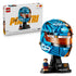 LEGO McLaren Formula 1 helmet collectible features blue, orange and black plastic brick construction shaped as Oscar Piastri’s racing helmet with tinted visor, display stand and driver minifigure.