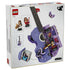 LEGO Editions Olivia Rodrigo's Dual Guitar set 43031 box back shows the lavender guitar opened to reveal display rooms, two minifigures and a removable interior module.